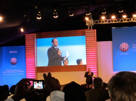 Day three, High Level Roundtable on Social Determinants of Health and the Life Course. Opening statements by panelists and moderated roundtable discussion by Riz Khan, Al Jazeera English (at the photo). Participants: Marie-Paule Kieny (assistant director-general of Innovation, Information, Evidence and Research of WHO), Geeta Rao Gupta (deputy executive director of UNICEF), Purnima Mane (deputy executive director, assistant secretary-general of UNFPA), William Lacy Swing (director-general IOM), Assane Diop (executive director, Social Protection Sector, ILO) and Maria Guzenina-Richardson (minister of Health and Social Services of Finland).